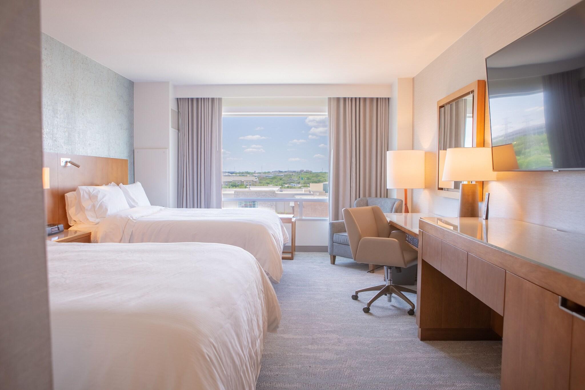 Quadruple Deluxe Two Queen Beds