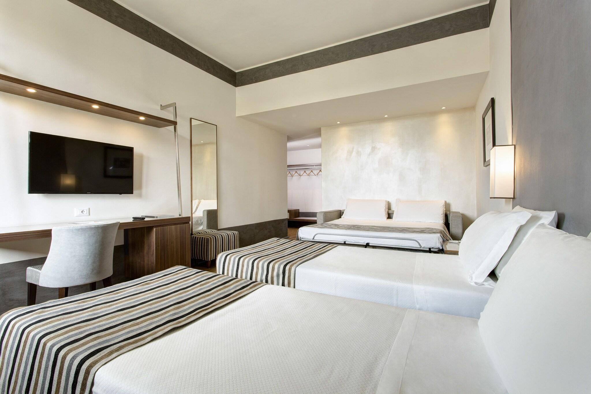 Quadruple Two King Beds