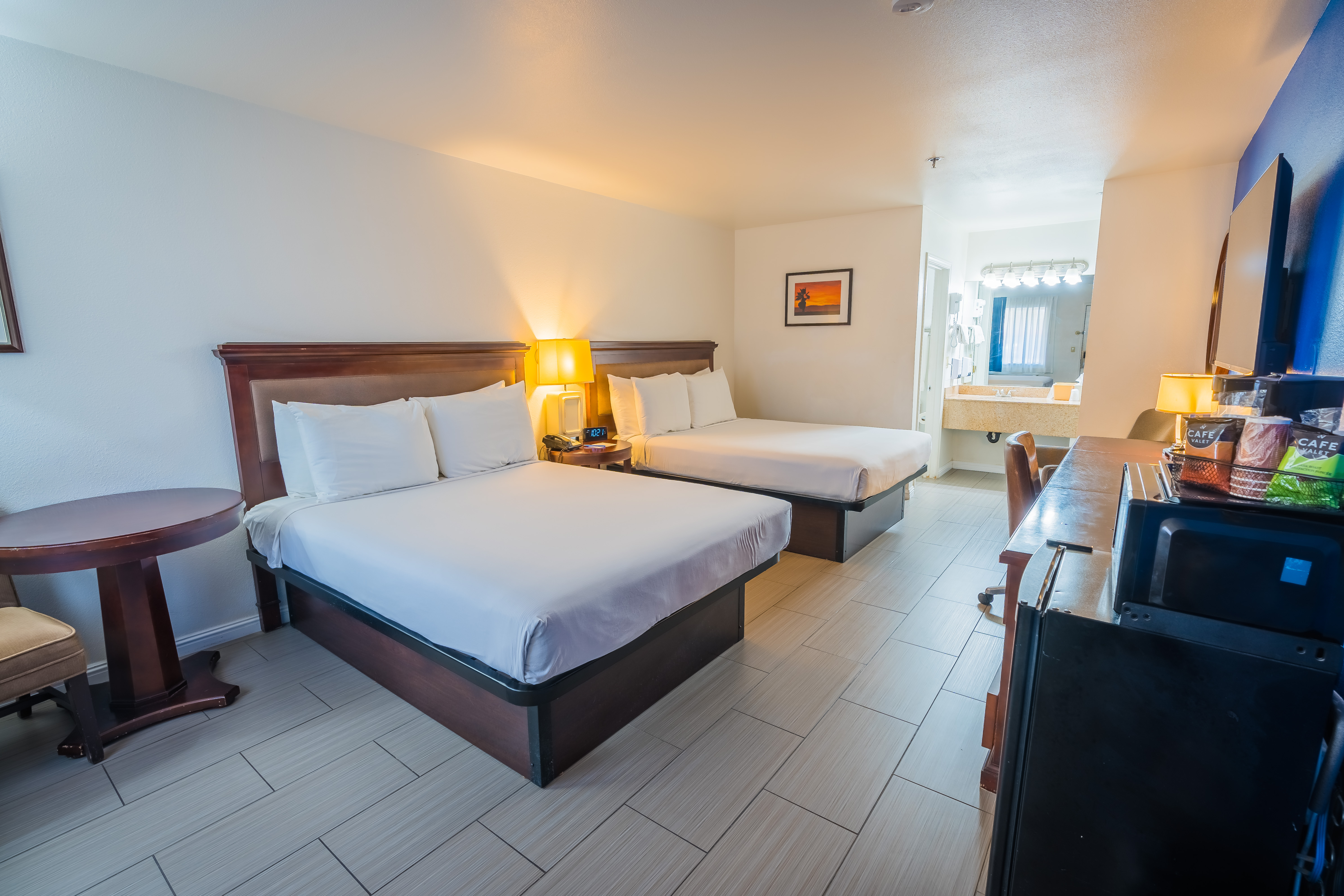 Quadruple Deluxe Queen Bed