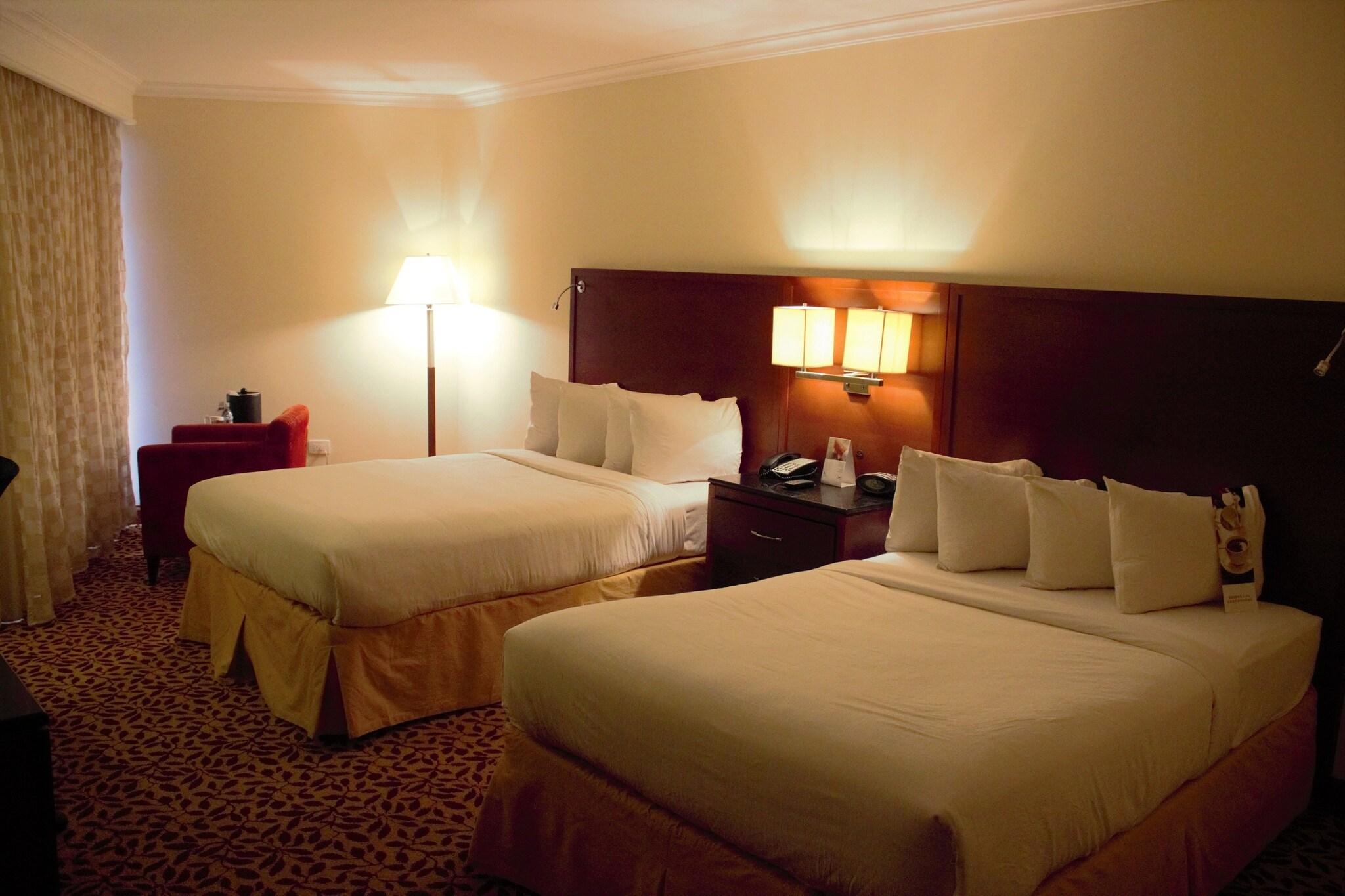 Quadruple Partial Ocean View Two Double Beds