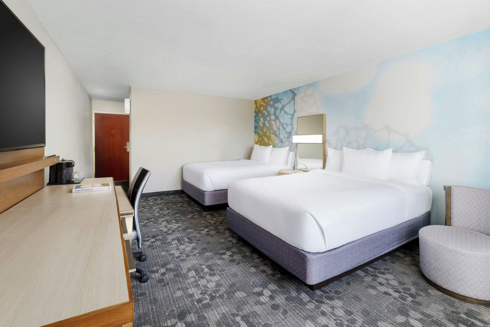 Quadruple Two Queen Beds