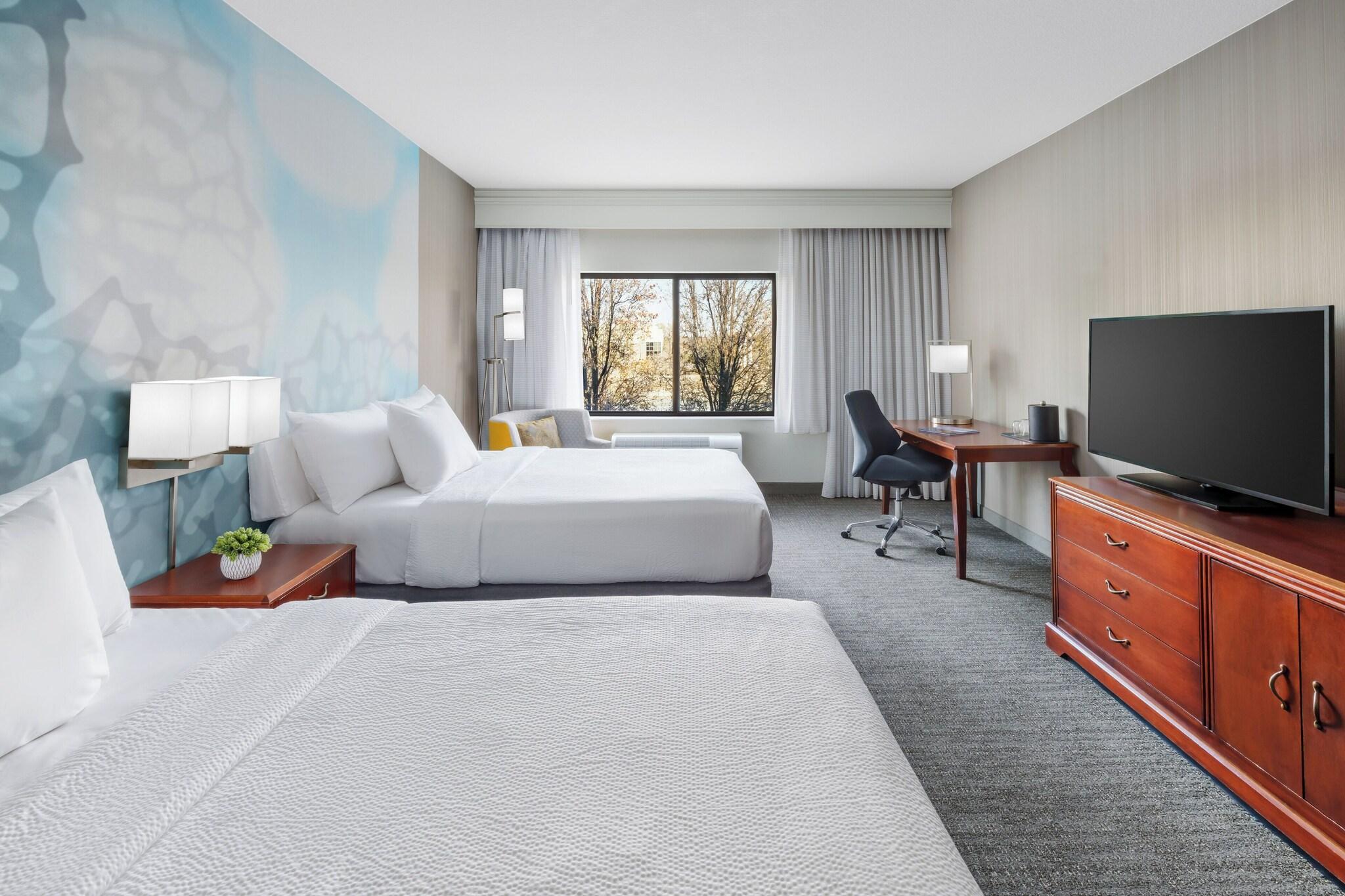Quadruple Two Queen Beds