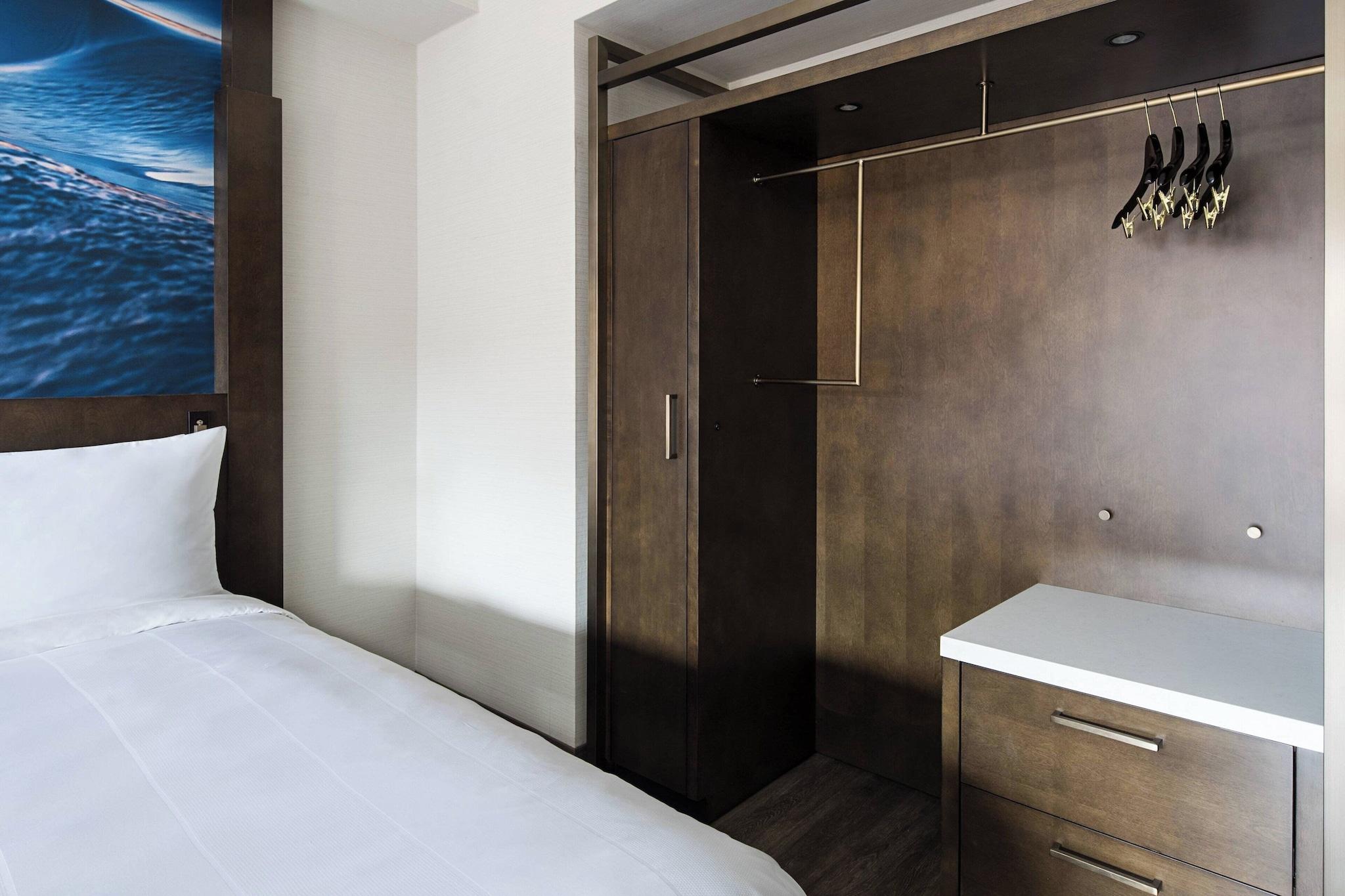 Quadruple Deluxe Two Queen Beds