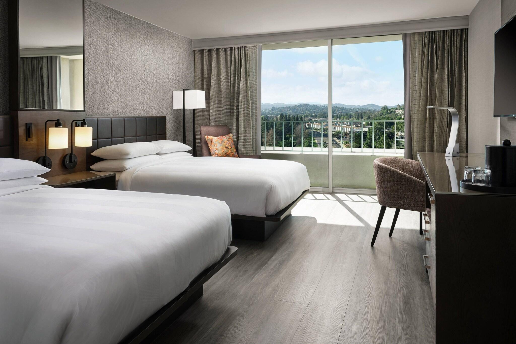 Double Club Two Queen Beds