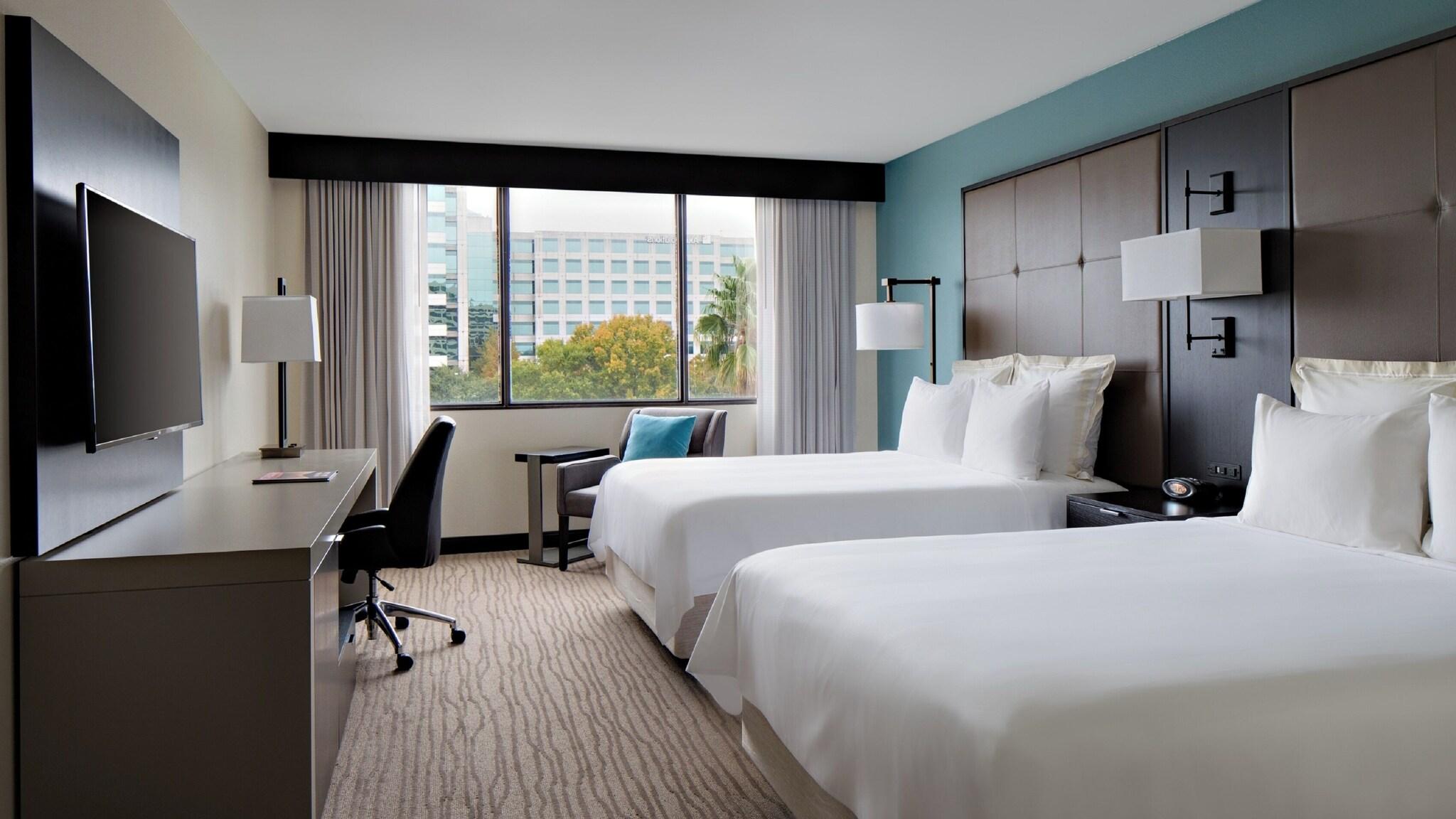 Quadruple Club Two Queen Beds